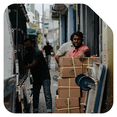 Hans Air Express delivery worker handling a domestic parcel for doorstep courier service in Mumbai
