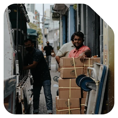 Hans Air Express delivery worker handling a domestic parcel for doorstep courier service in Mumbai